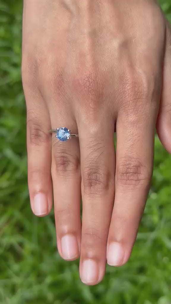 1.75 ct heated blue Ceylon sapphire, round cut, close-up video showing color and brilliance
