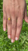 1.63 ct heat-treated Ceylon Orange Sapphire, Oval Cut, close-up video showing color and brilliance