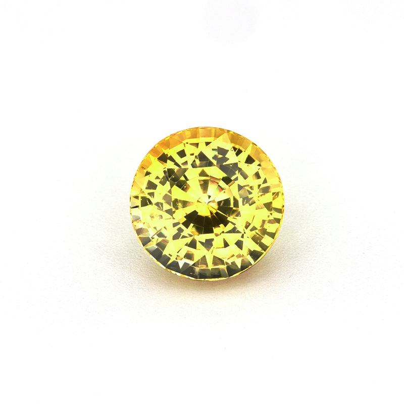1.50 ct vivid yellow sapphire video showing brilliance and golden hue under light