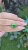 Tsavorite garnet in the hand Image 