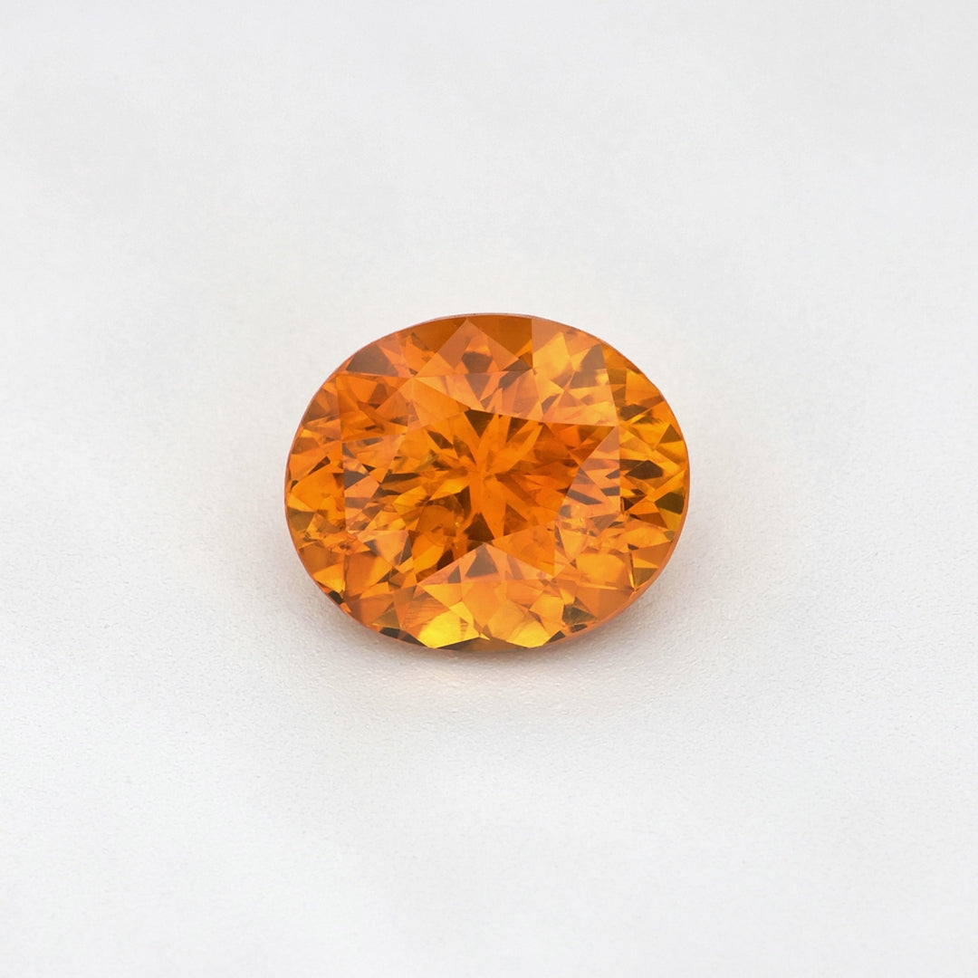 1.63 ct heat-treated Ceylon Orange Sapphire, Oval Cut, video showing color and brilliance