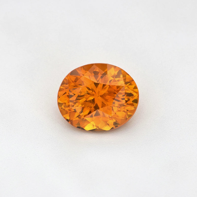 1.63 ct heat-treated Ceylon Orange Sapphire, Oval Cut, video showing color and brilliance