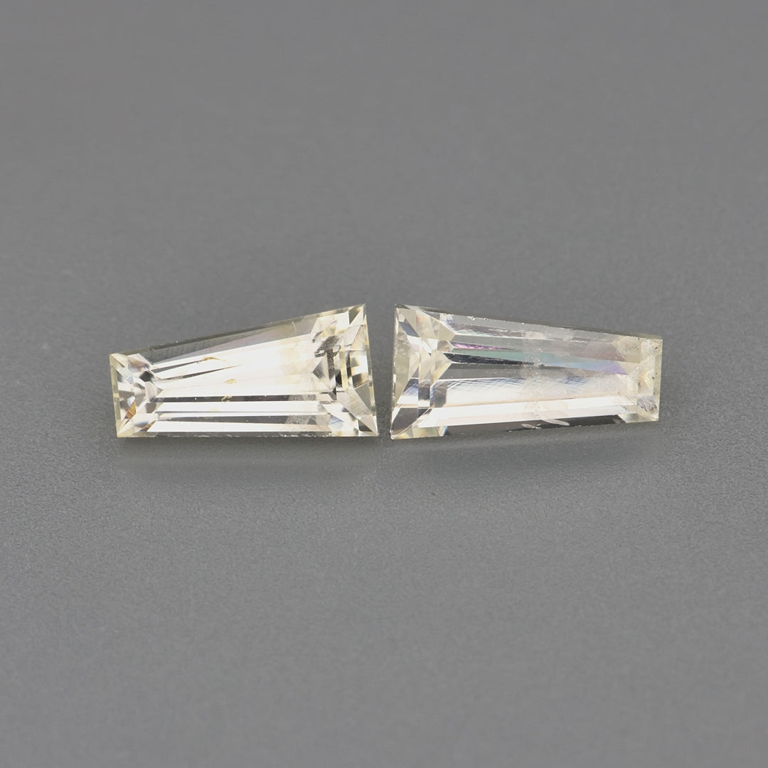 Load video: 0.87 ctw Tapered Baguette cut Yellow Sapphire ~ matched pair