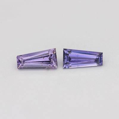 0.69 ctw matched pair tapered baguette purple sapphires rotating to show color and brilliance