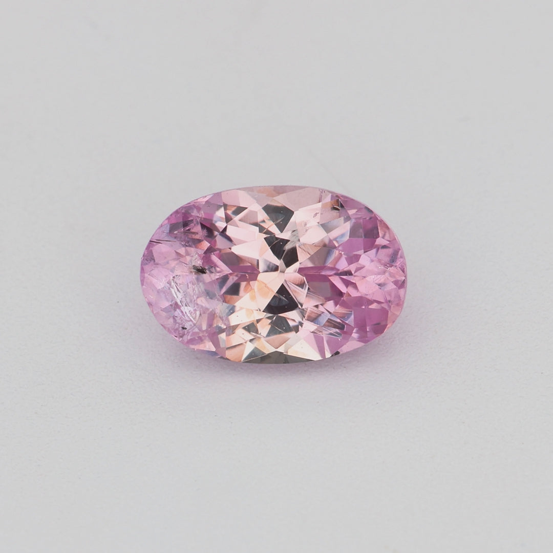 0.57 ct oval unheated pink sapphire video showing soft pink color and brilliance