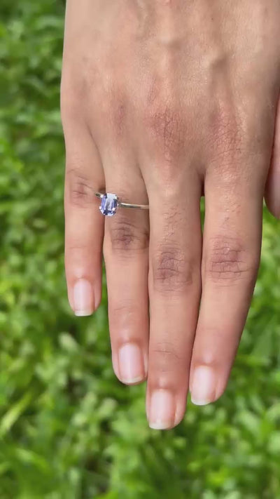 1.10 ct natural violet sapphire video showing emerald cut sparkle under light