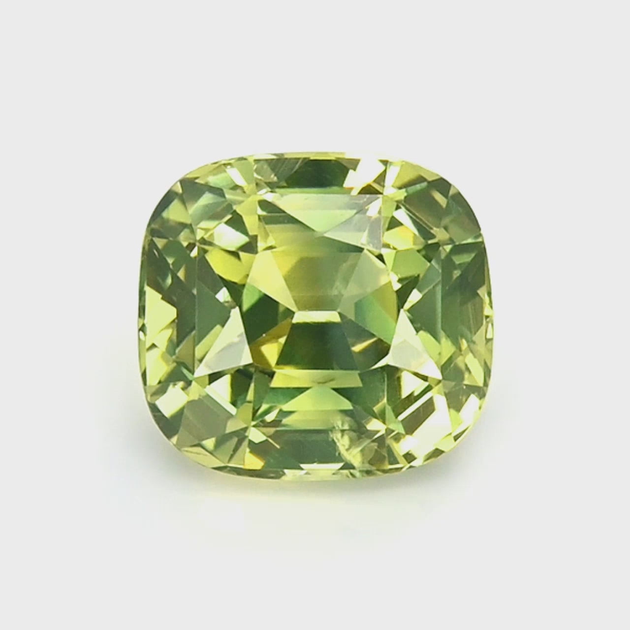 1.46 ct unheated olive green Ceylon sapphire video showing cushion cut and earthy green color