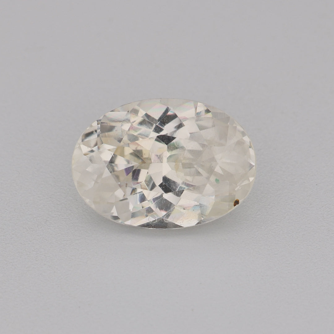 0.95 ct calibrated 7x5mm oval white sapphire video showing brilliance and clarity