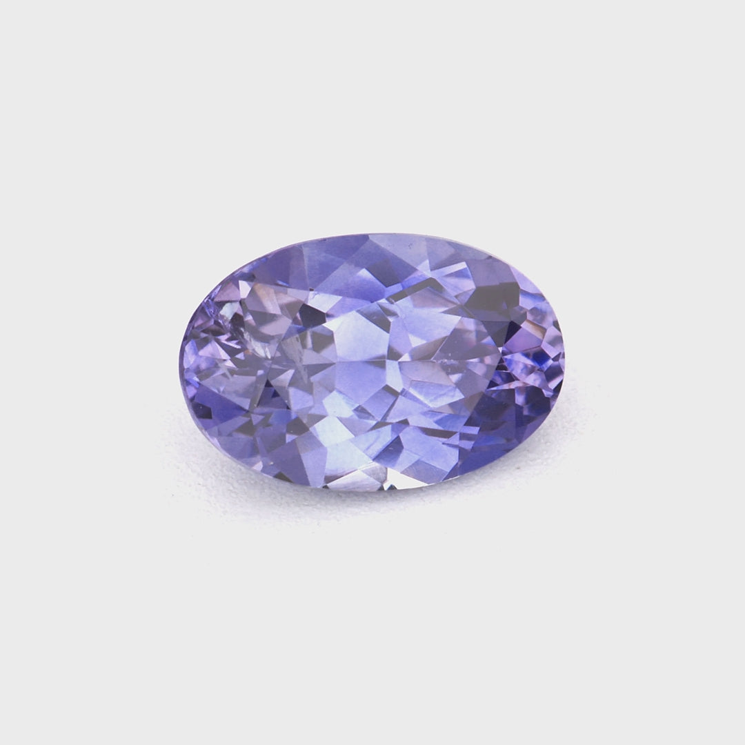0.56 ct oval heat-treated violet sapphire rotating to show rich violet color and brilliance