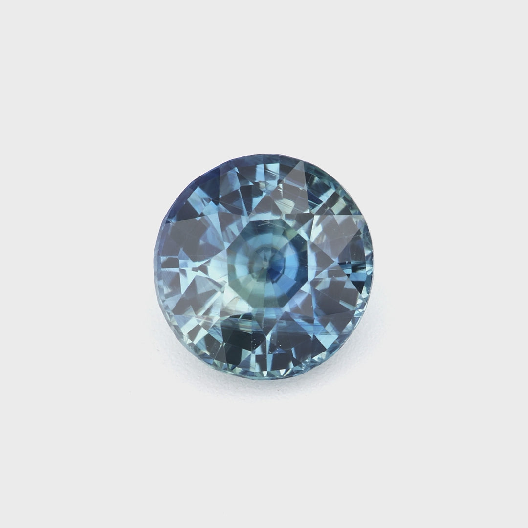 1.08 ct unheated teal sapphire video showing round cut and blue-green color