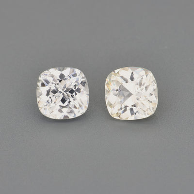 Matched pair of 0.93 ctw cushion cut unheated white sapphires video showing brilliance and clarity