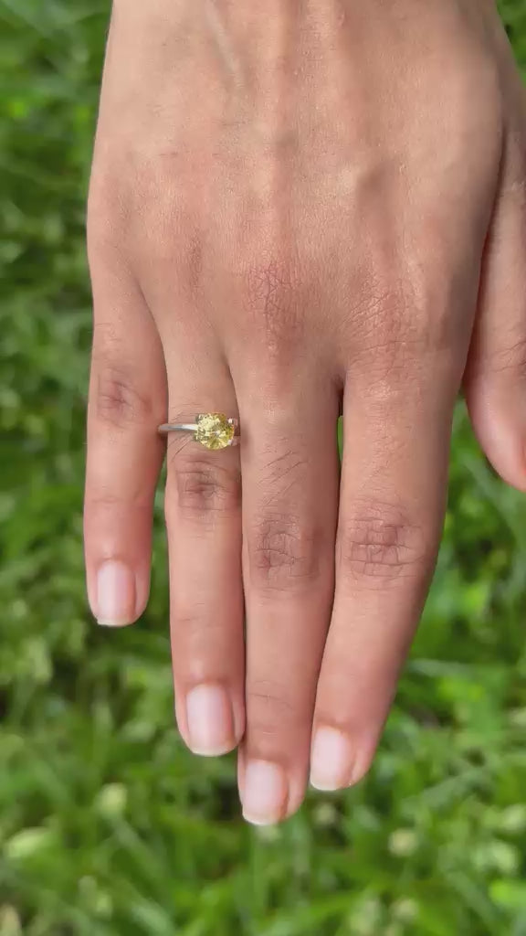 1.50ct Vivid Round Yellow Sapphire Hand Shot