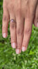1.13 ct Vietnam purplish pink sapphire stone in hand