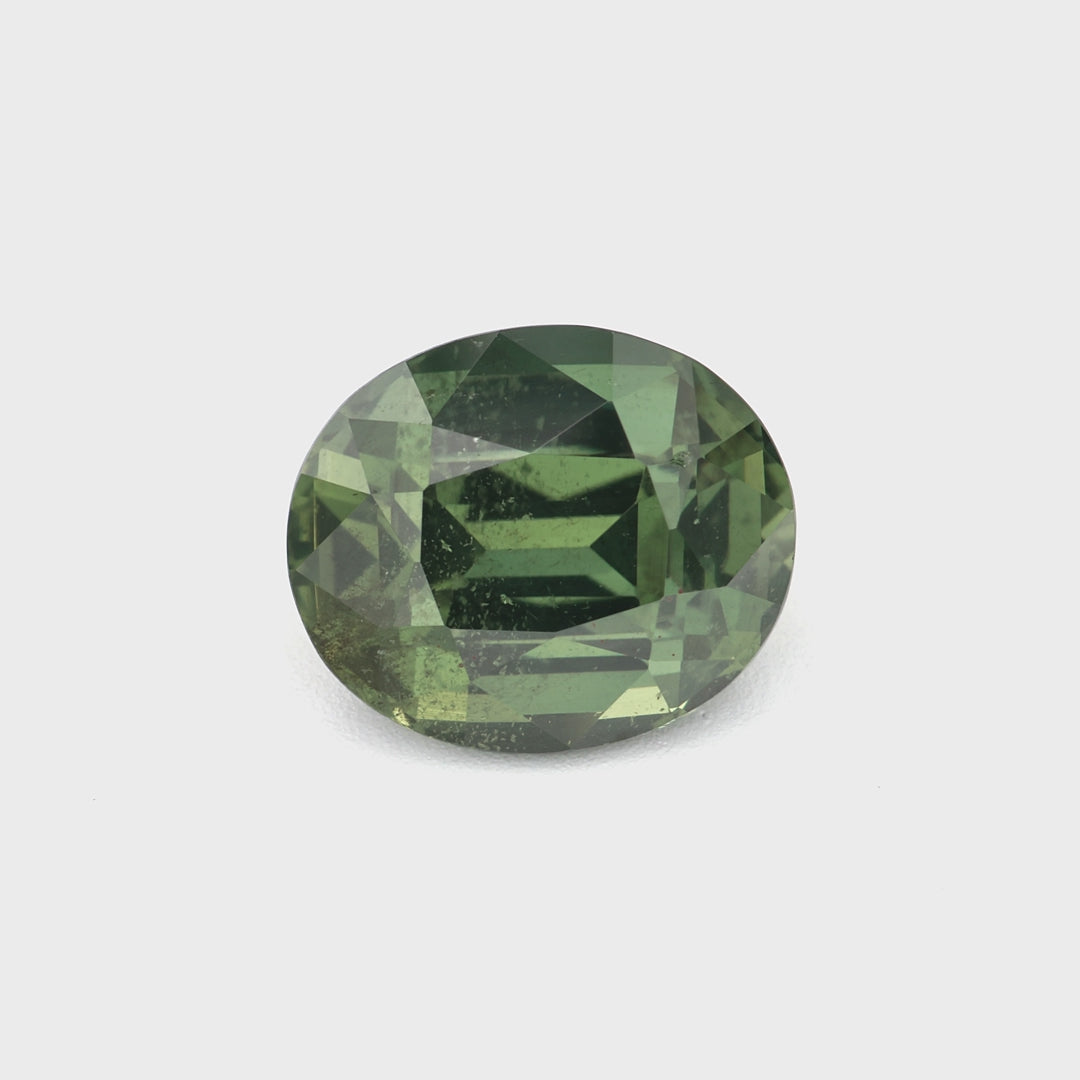 2.08 ct oval green sapphire from Tanzania — green color and brilliance demonstrated