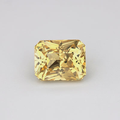1.66 ct radiant cut unheated yellow sapphire rotating to show golden hue and brilliance