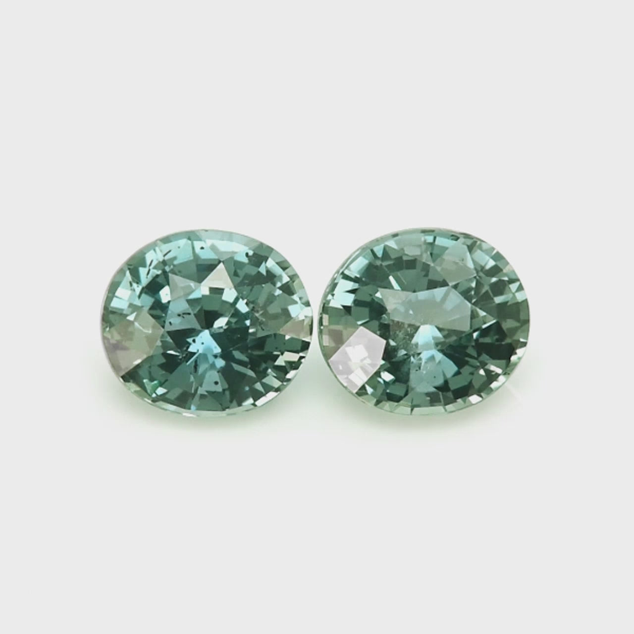 Load video: 1.50 ctw Teal Sapphire ~ matched pair