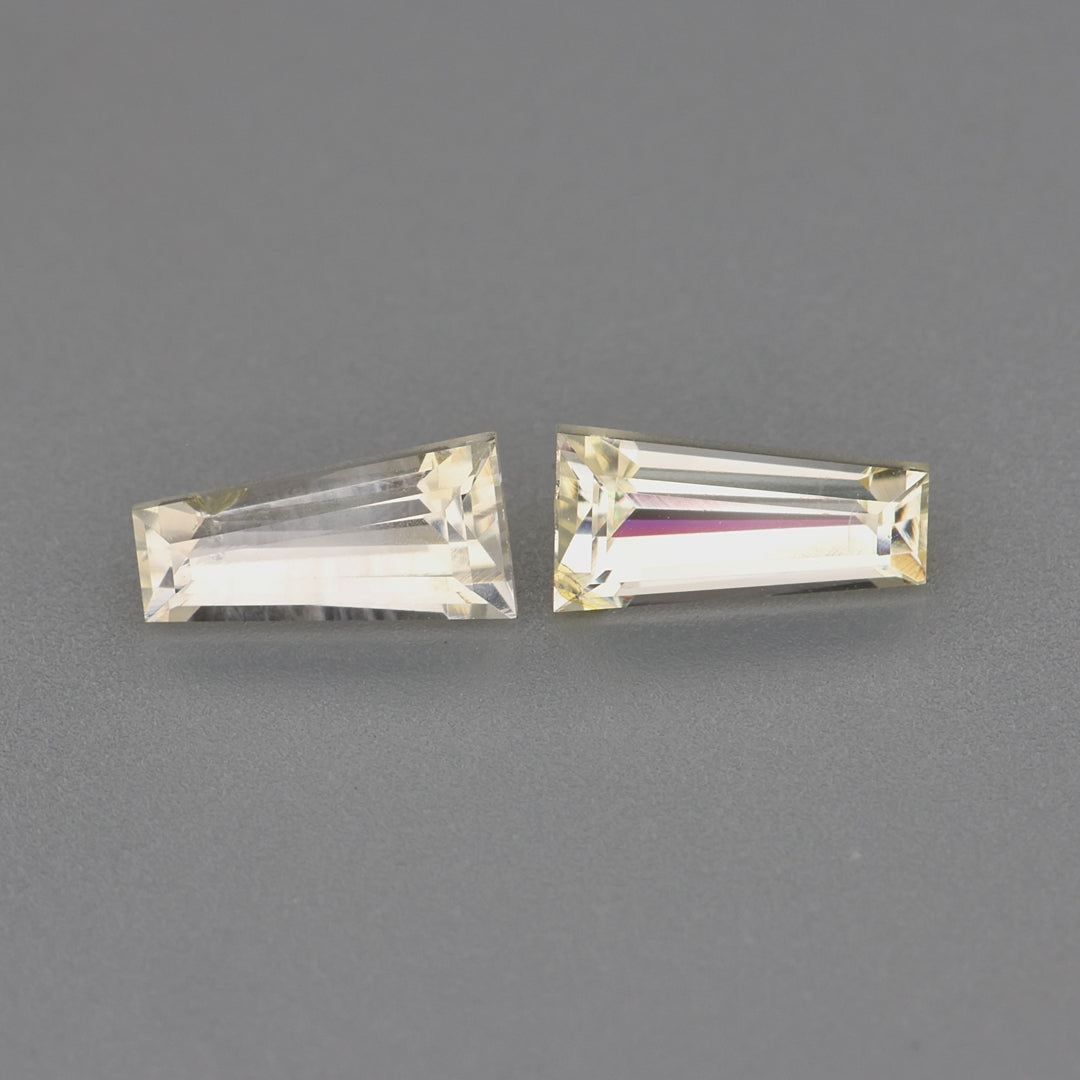 Load video: 0.88 ctw Tapered Baguette cut Yellow Sapphire ~ matched pair