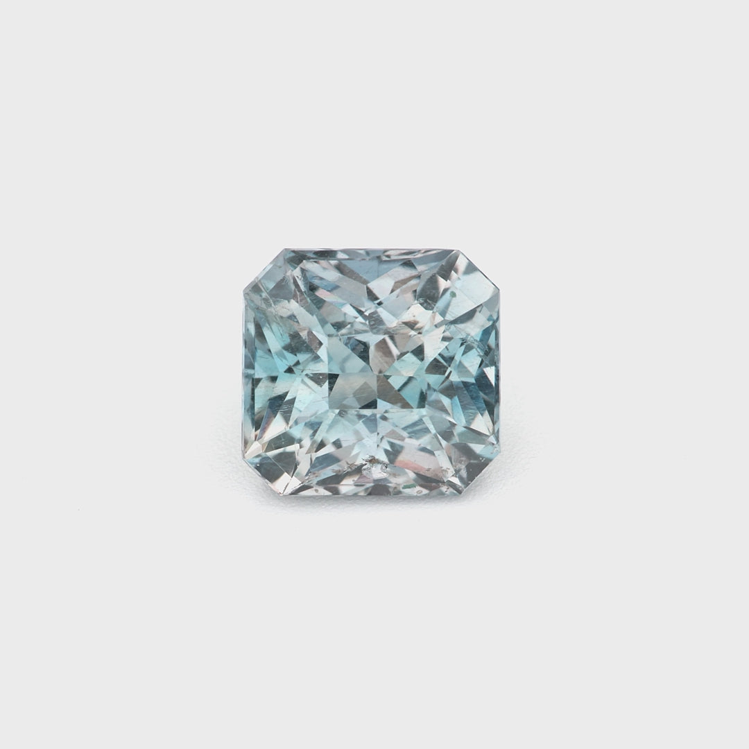 1.29 ct unheated teal-grey sapphire video showing octagon cut and color-shifting hue
