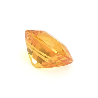 1.13 ct golden yellow sapphire cushion cut gemstone with brilliant clarity and rich orangish-yellow hue