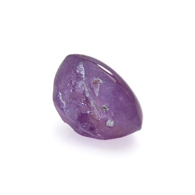 3.26 ct untreated purple Star Sapphire from Sri Lanka with six-ray star asterism under light